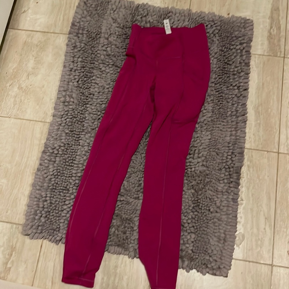 Lululemon size 0 hot pink leggings 25 inseam with side pockets